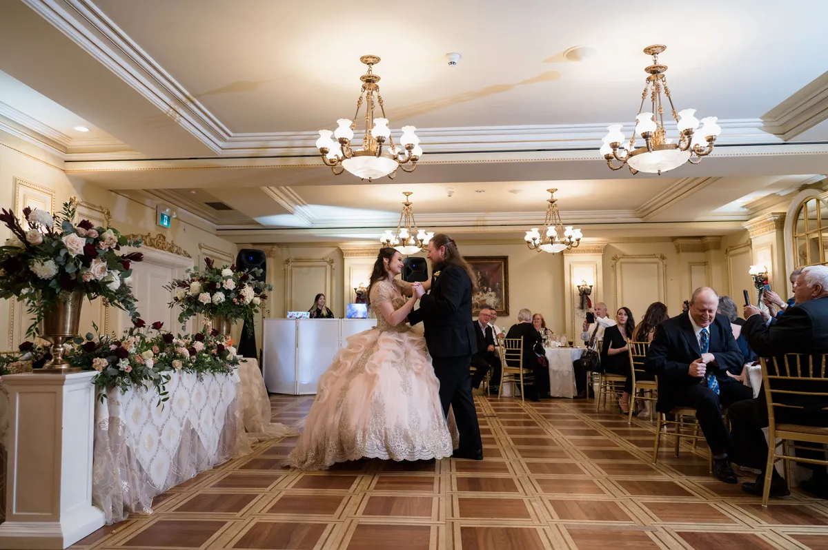 First dance in an elegant ballroom with the Sound of Harmony DJ booth behind