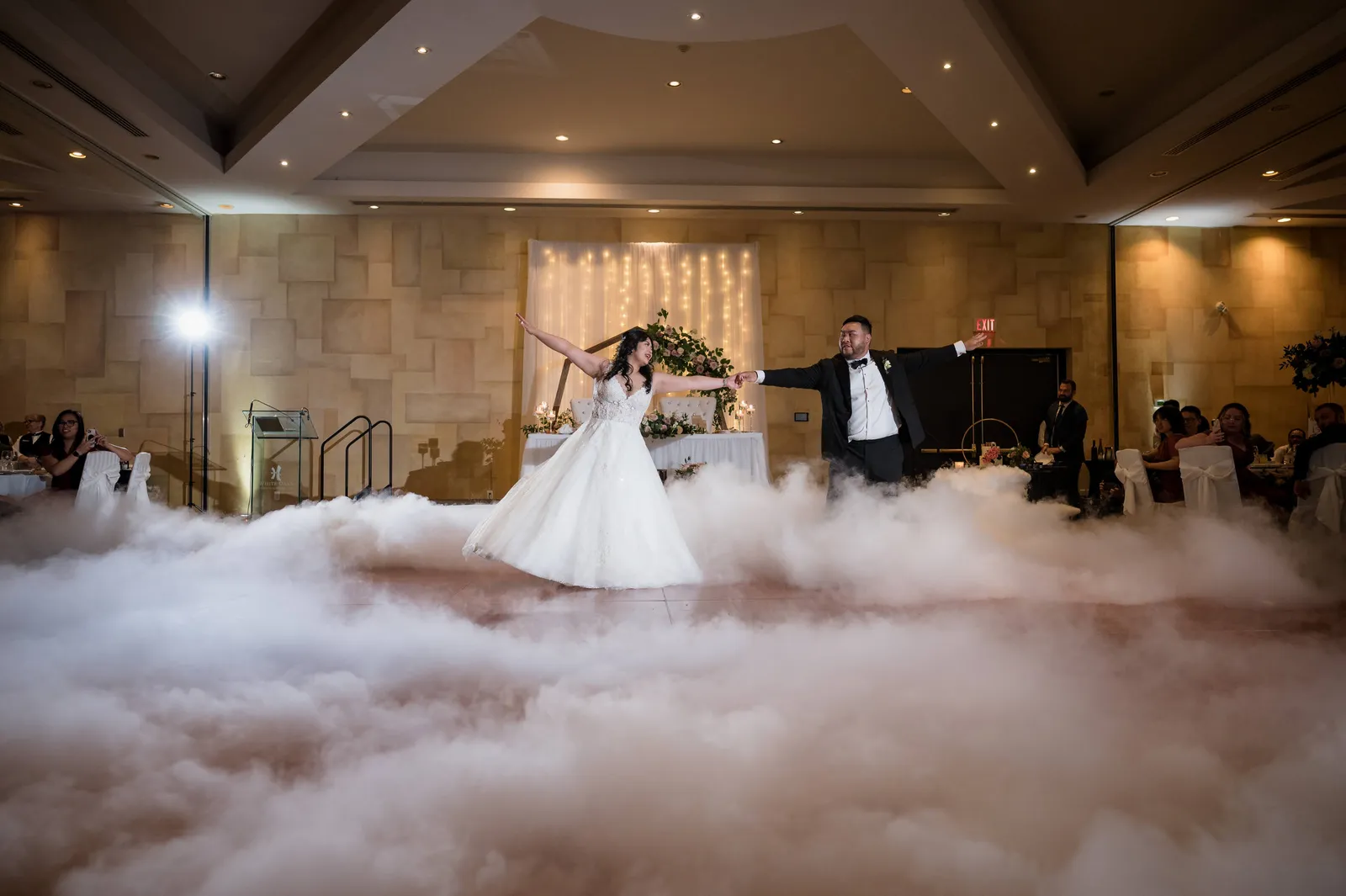 Bride and groom first dance on a cloud with dry-ice effect by Sound of Harmony DJ Services in Niagara