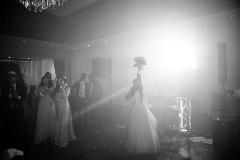 wedding DJ performing at reception dance floor